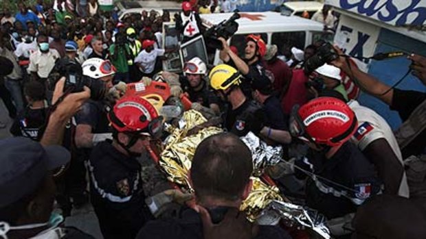 Rescued ... Darlene Etienne, 16,  survived 15 days buried in the rubble after the earthquake.