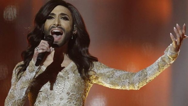 Singer Conchita Wurst, representing Austria, performs the song <i>Rise Like a Phoenix</i>.