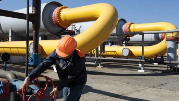 No deal: A Ukrainian worker operates a valve in a gas storage point in Strij, outside Lviv, Ukraine. 