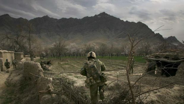 Australian and Afghan troops on patrol.