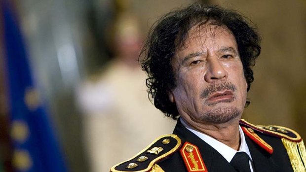 Muammar Gaddafi ... his convoy was attacked.