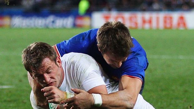Mark Cueto of England goes over to score a try.