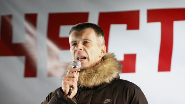 Mikhail Prokhorov, Russian billionaire and presidential candidate, speaks at a protest rally in Moscow.