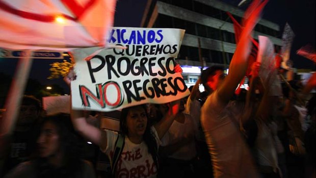Rallying call &#8230; anti-PRI protesters at a demonstration in Guadalajara, Mexico.
