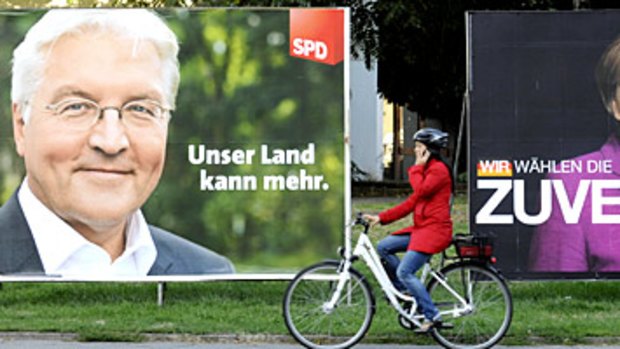 Uneasy partnership... election poster for Frank-Walter Steinmeier's SDU and Angela Merkel's CDU.