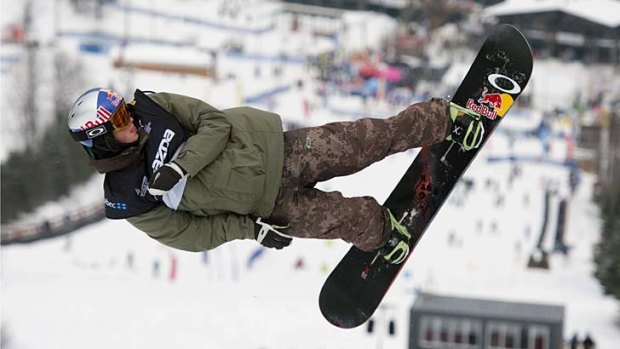 Scotty James competes in the snowboard World Cup halfpipe.