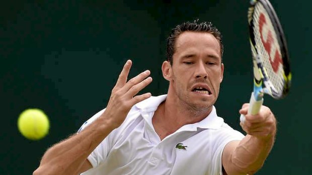 France's Michael Llodra withdrew from his singles clash only to reappear in the doubles.