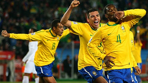 Juan celebrates scoring from a corner during the 2010 FIFA World Cup South Africa.