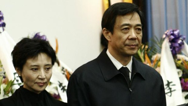 Scandal: Lawyer Gu Kailai and her husband, leading politician Bo Xilai. Ms Gu is being held on suspicion of murder.