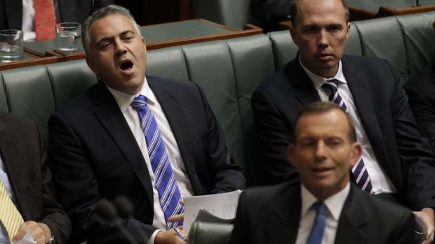 Julia Gillard has attacked the opposition as dominated by males with blue ties. Pictured from Parliament on Wednesday May 15 are shadow treasurer Joe Hockey, Opposition Leader Tony Abbott, and opposition health spokesman Peter Dutton.