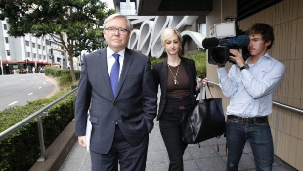 Former prime minister Kevin Rudd leaves a home insulation inquiry hearing in May.