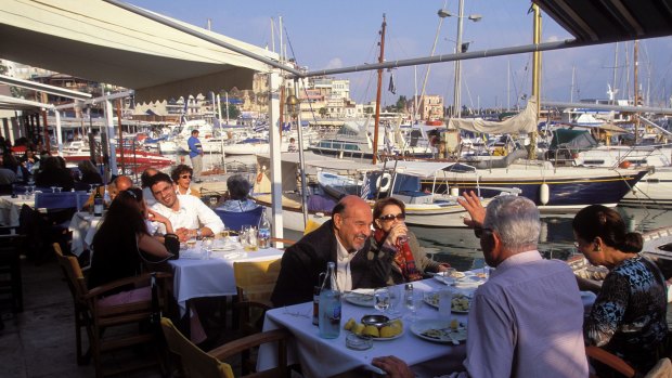 Taking it easy: The port of Piraeus, Athens, is known for its seafood restaurants.