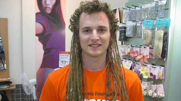 Andrew McMillen enjoys his last moments with his dreadlocks.