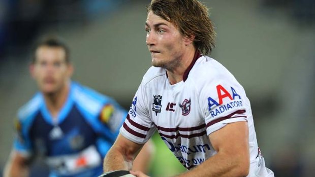 Kieran Foran looks to create something against the Titans in Round 10.