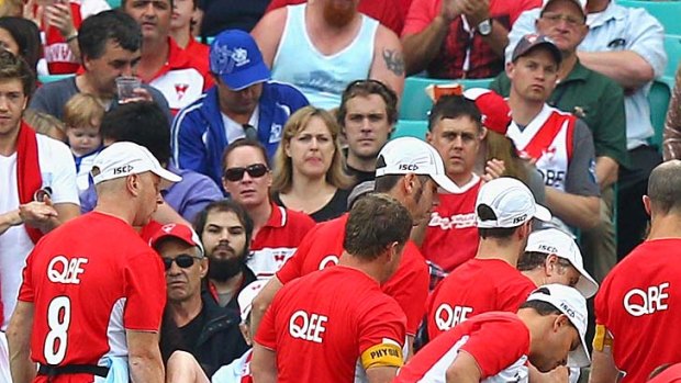Bad break: Gary Rohan is carried off the SCG after breaking his leg yesterday.