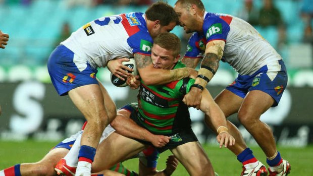 Outer: George Burgess in action against the Knights.