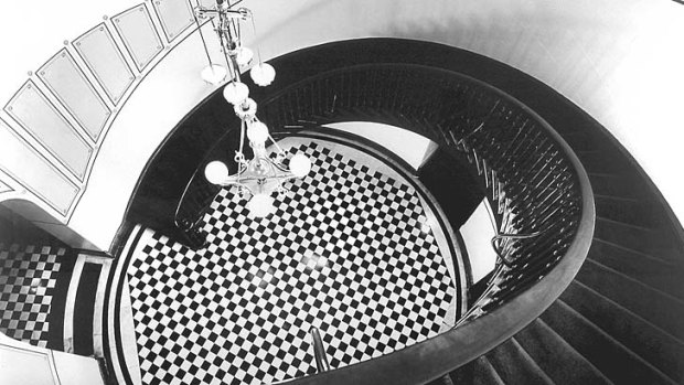 Shadows and spirals: A staircase at the Supreme Court, Sydney, by Max Dupain.