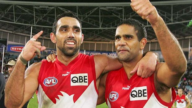 Adam Goodes and Michael O'Loughlin celebrate a victory over Collingwood in 2005.