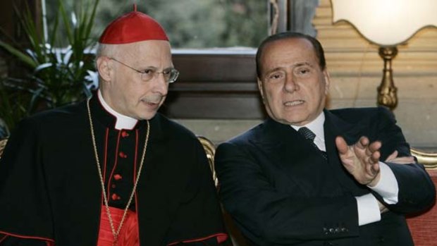 Cardinal Angelo Bagnasco with Silvio Berlusconi.