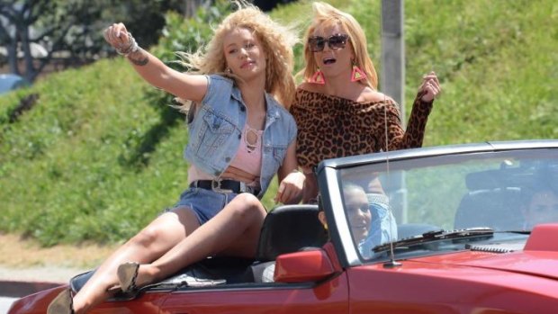 Iggy Azalea and Britney Spears on the set of their music video in Los Angeles in April.