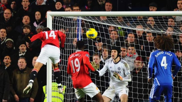 Timely goal: Manchester United's Javier Hernandez heads one home to level the scores.