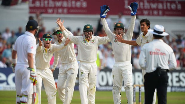 Not out: The Australian team appeals unsuccessfully for the wicket of Stuart Broad.