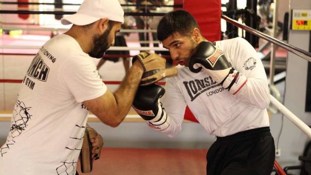 Second chance: Billy Dib works out before his title fight.