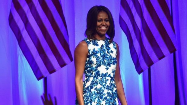 Role model: Michelle Obama is encouraging young Americans from low-income families to aspire to college educations.