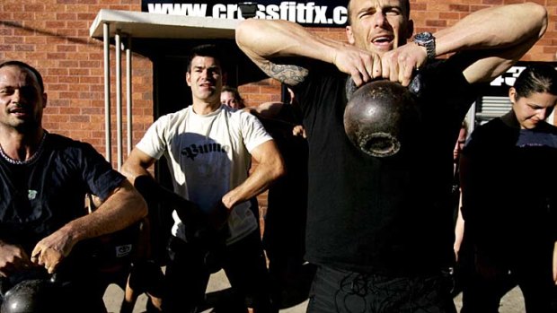 CrossFit instructor Steve Willis instructing a group Session.