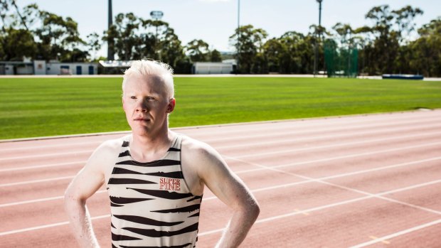 Sprinter Chad Perris says albinism has not stopped him from training outside in the scorching summer heat.