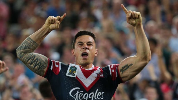 To the victor, the spoils: Sonny Bill Williams celebrates the Roosters’ win.