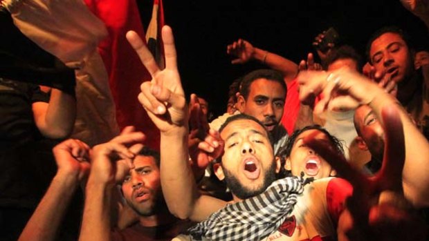 Egyptian residents celebrate the resignation of President Hosni Mubarak