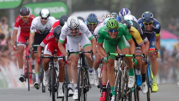 Germany's Marcel Kittel, in green jersey, powers towards the stage win and another 50 points.