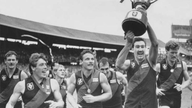 Essendon players celebrate winning the 1985 premiership, having also won it the year before.