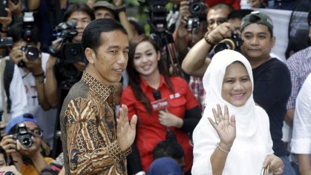Indonesian president-elect Joko Widodo, popularly known as "Jokowi", and his wife Iriana.