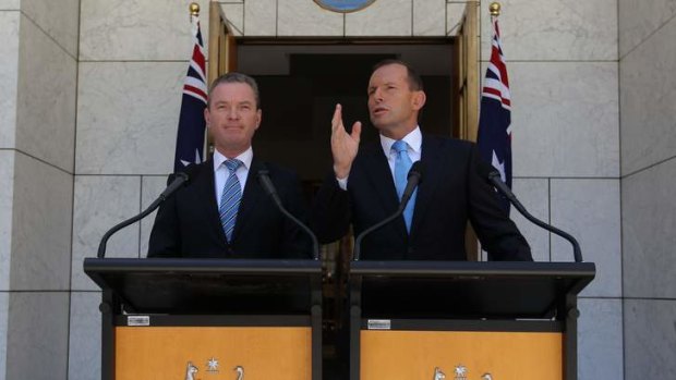 Education Minister Christopher Pyne and Prime Minister Tony Abbott address the media at Parliament House.
