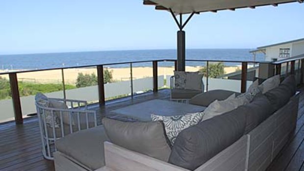 By sea and sand ... the five-bedroom Singleton Beach House at Killcare Beach.