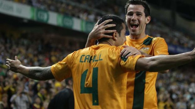 Milestone goal: Tim Cahill celebrates his goal with Ryan McGowan in Australia's 1-0 win over Costa Rica.
