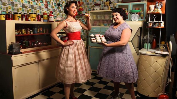 Time warp: Miss Candy Floss, 28, left, and Miss Belles B Ringing, 33, in the photographic studio of Miss Pinup Australia organiser Miss Pixie.