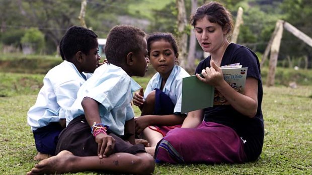 Teaching students at a Fijian school.