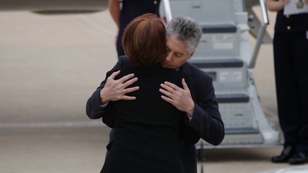 Prime Minister Julia Gillard and Defence Minister Stephen Smith attend the funeral of Private Nathanael Galagher.