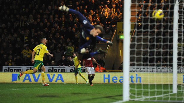 Winner: Anthony Pilkington's header beats Manchester United  keeper Anders Lindegaard to give Norwich City a 1-0 victory.