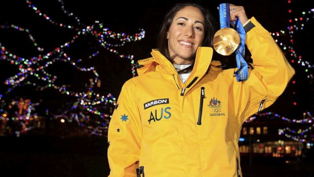 Lydia Lassila of Australia poses with the gold medal for the ladies' aerials freestyle in Vancouver 2010.