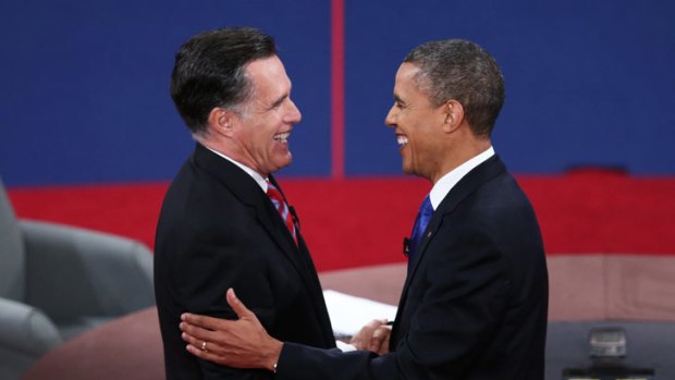 Questionable love fest: Republican candidate Mitt Romney and US President Barack Obama.