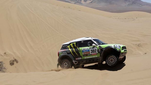 France's Stephane Peterhansel and co-pilot Jean-Paul Cottret in their Mini during the 13th stage of the Dakar Rally.