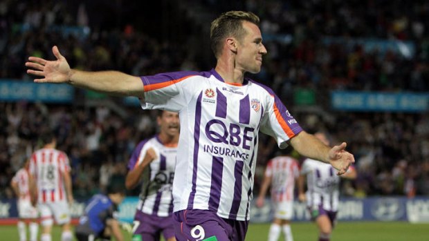Perth's Shane Smeltz celebrates one his three goals in yesterday's elimination semi-final against Melbourne Heart.