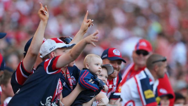 Sell-out crowd: Roosters fans celebrate a try in Thursday’s 34-10 win against the Dragons.
