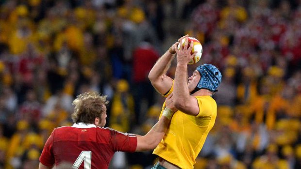 Up and away: James Horwill snatches the ball.