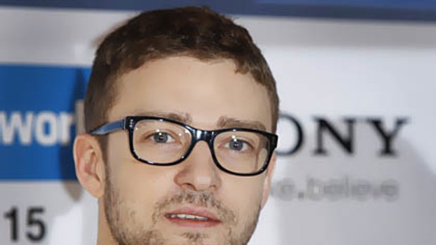 Actor Justin Timberlake poses during a photocall for the film The Social Network.
