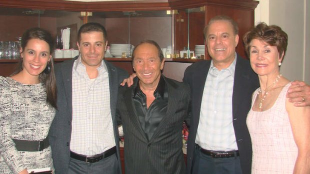 Aaron Gomes (second from left) with wife Lisa, entertainer Paul Anka, dad Dennis and mum Barbara.